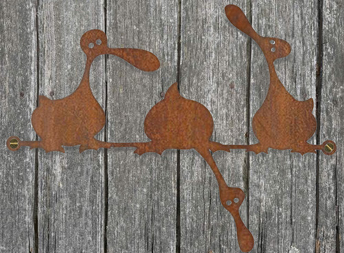ducks on fence
