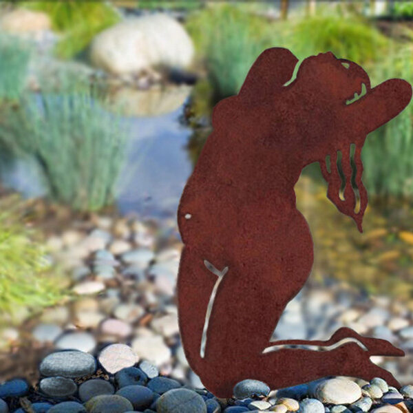 woman washing hair by river